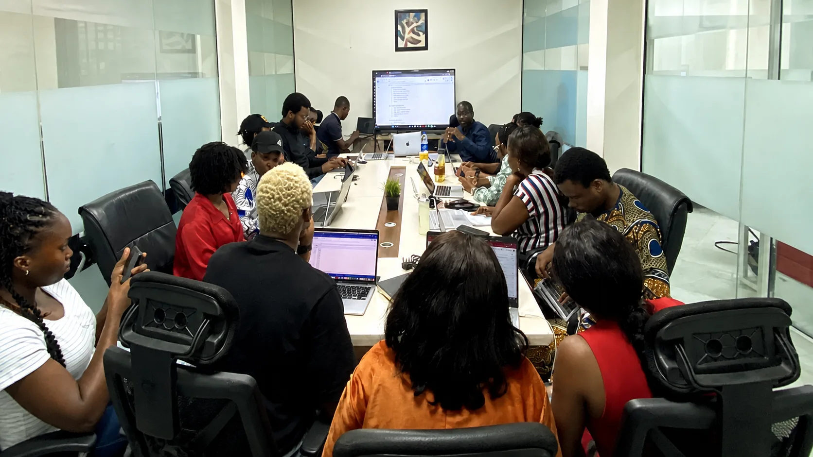 Gatekeyper team collaborating around a conference table